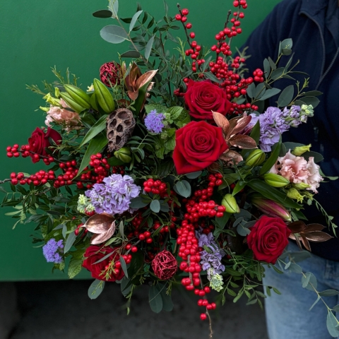 Christmas bouquet with berries and roses available for delivery before Christmas 