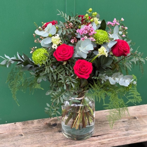 Lover Valentine’s Day bouquet featuring red roses and seasonal foliage, available for flower delivery in Darlington.