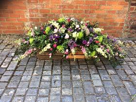 Pink, purple and Green Coffin Spray